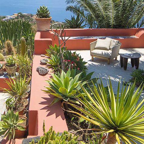 paola lenti sabi outdoor armchair in situ