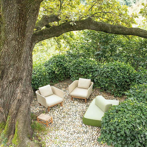 paola lenti sabi outdoor armchairs in situ