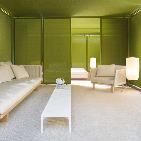 paola lenti sabi outdoor armchair and sofa in situ