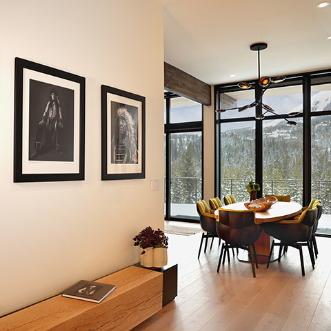 modern dining room featuring smart home technology at 232 lake lodge moonlight basin big sky, mt