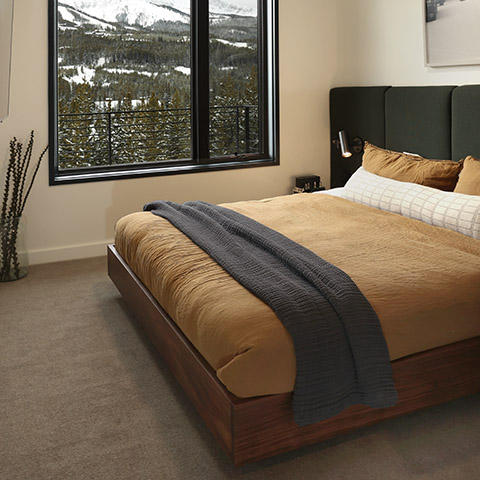 mountain modern bedroom featuring smart home technology at 232 lake lodge moonlight basin big sky, mt