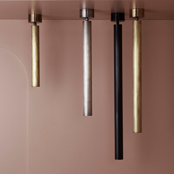 four apparatus cylinder pendant lights in situ