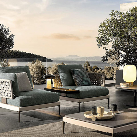 minotti patio outdoor armchairs in situ