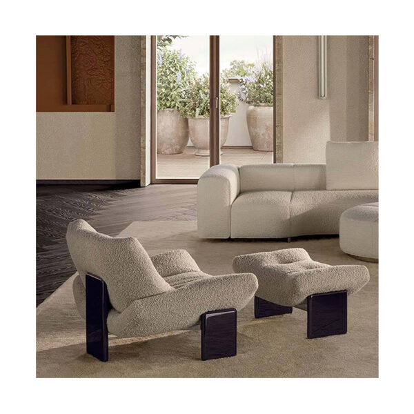 minotti emmi armchair and emmi footstool in situ